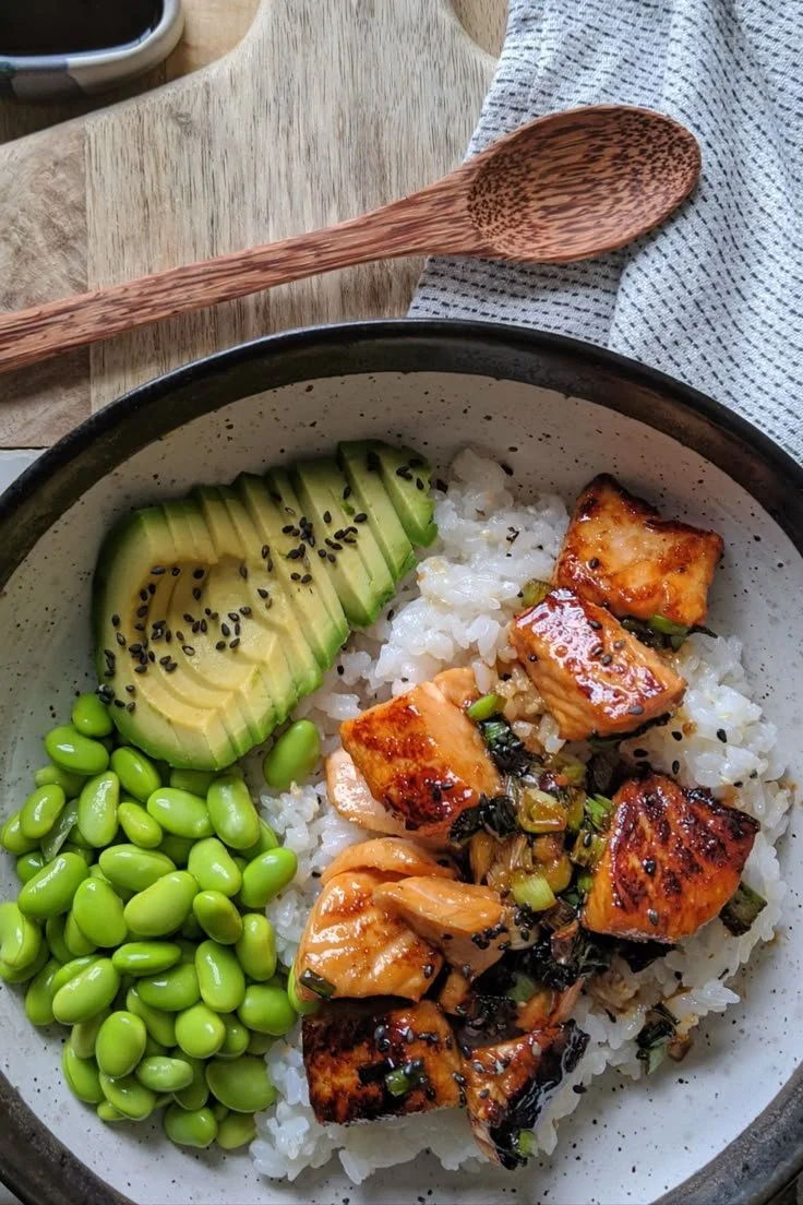 Delicious Teriyaki Salmon Sushi Bowl with fresh vegetables and rice